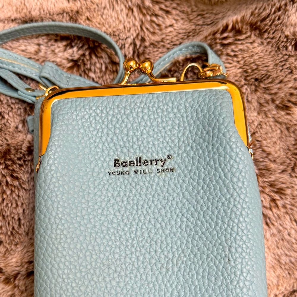 Wallet with crossbody strap. Beautiful Tiffany blue color.